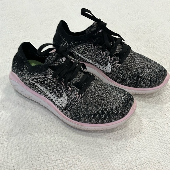 Nike Shoes - Nike free RN fly it black and pink shoes,mixed size pair left 6.5, right 6